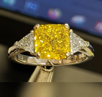 Cushion vivid yellow diamond with side Triangles